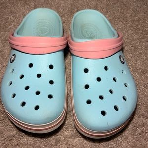 Blue and pink crocs
